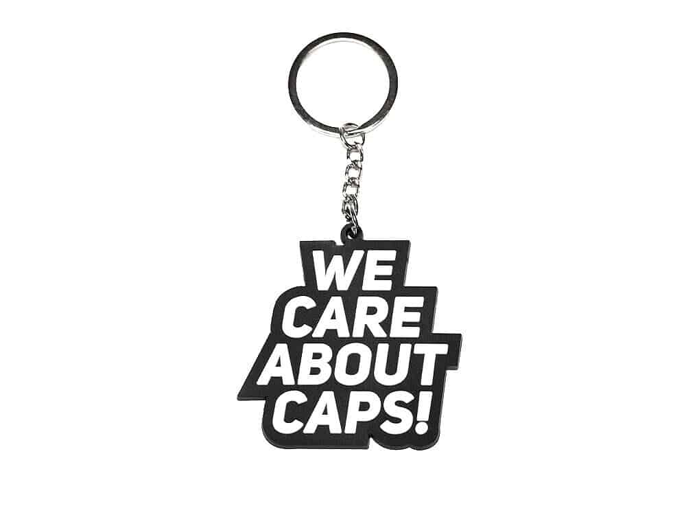 Llavero We care about Caps - Black and White Edition